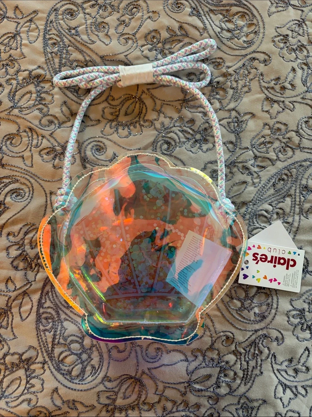 Claire's Iridescent Shell Crossbody Bag with Pink and Green Stars
